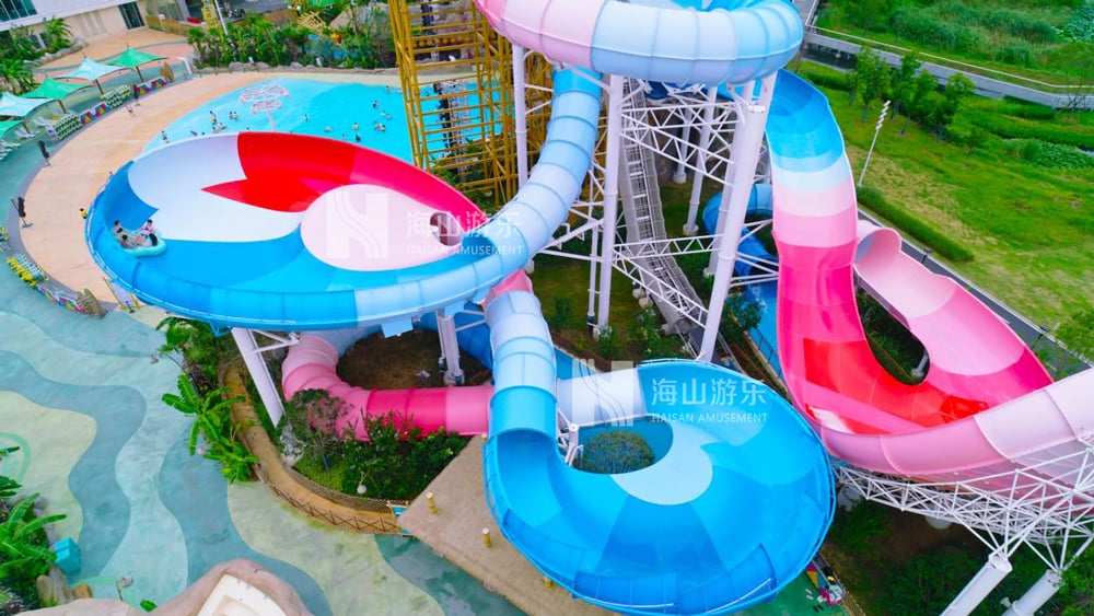 双重风暴，极致竞速——星际盘旋+巨浪翻滚组合引爆水乐园刺激体验